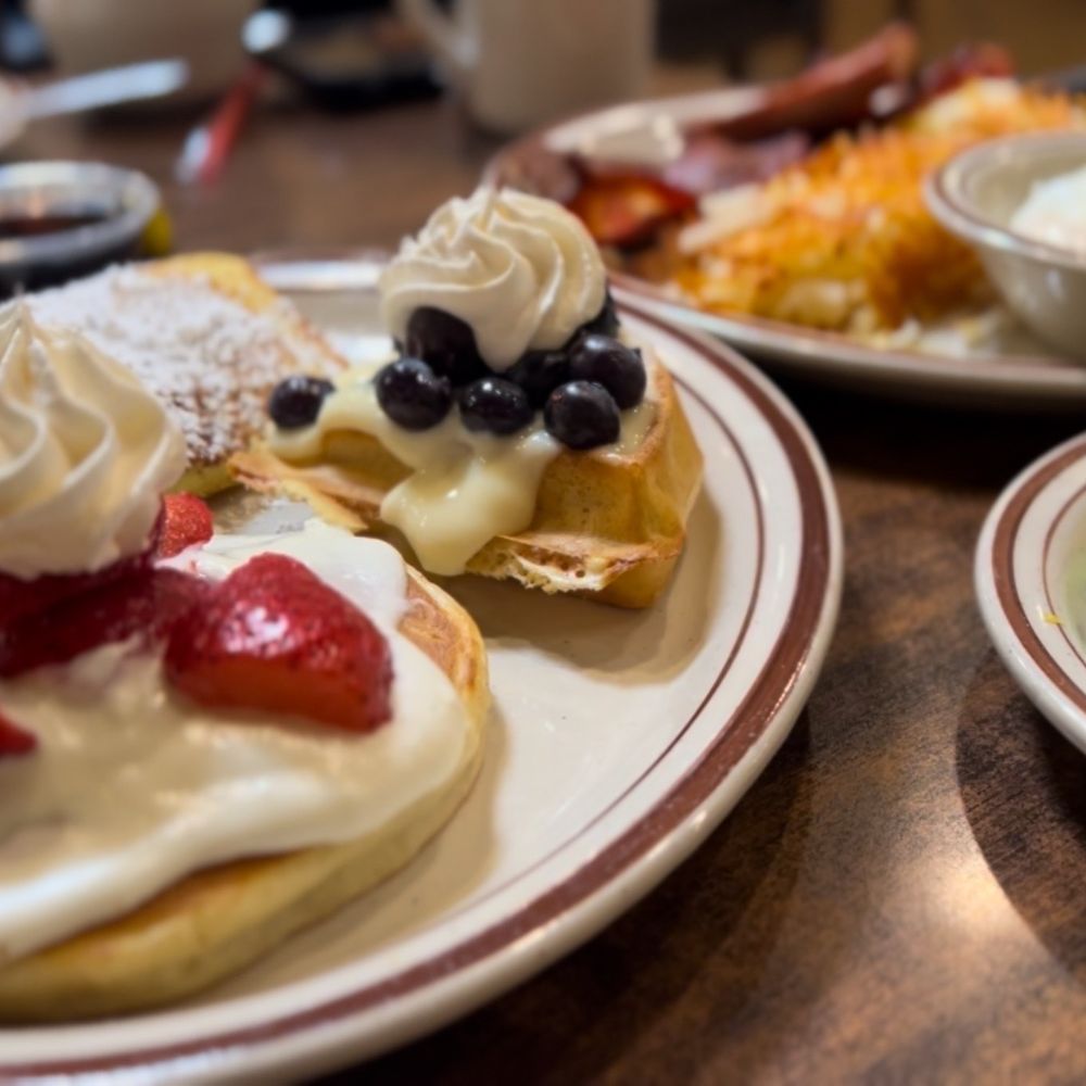 two plates of food on a table two plates of food on a table