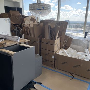 Old Castle Design - Piles of boxes that remained in my condo for three weeks when he said he would come pick them up. - Countertop Installation Near Me - Atlanta, Georgia Old Castle Design - Piles of boxes that remained in my condo for three weeks when he said he would come pick them up. - Countertop Installation Near Me - Atlanta, Georgia