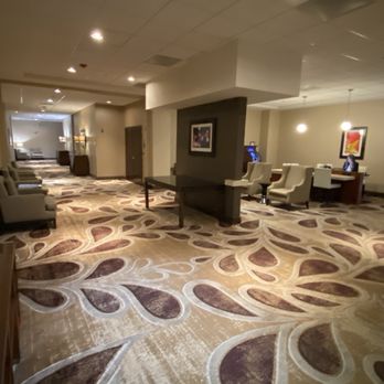 Hilton Concord - Another section of the first floor where the meeting rooms are located... the loose electrical plate is located where that lady is sitting - Hotels Near Me - Concord, California Hilton Concord - Another section of the first floor where the meeting rooms are located... the loose electrical plate is located where that lady is sitting - Hotels Near Me - Concord, California