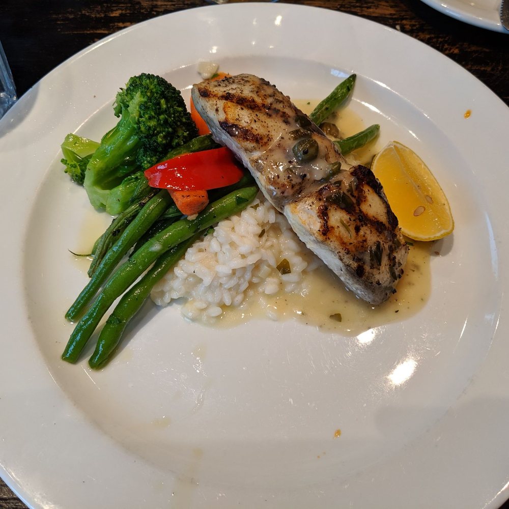 Tavolino - Pan seared Halibut with risotto - Italian Near Me - Toronto, Ontario Tavolino - Pan seared Halibut with risotto - Italian Near Me - Toronto, Ontario