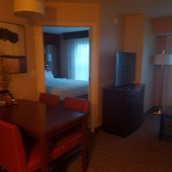 Residence Inn by Marriott Auburn - Dining table, master bedroom, and living area. - Hotels Near Me - Auburn, Maine Residence Inn by Marriott Auburn - Dining table, master bedroom, and living area. - Hotels Near Me - Auburn, Maine