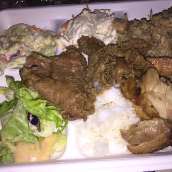 Germaine's Luau - All you can eat Buffet- teriyaki beef, pork, chicken, salad,  macaroni salad, rice, long noodles, cake, pineapple coleslaw - Hawaiian Near Me - Kapolei, Hawaii
