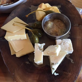 Bluebeard - Cheese plate with ameribella(top), scharfe maxx(left), blu di bufala(bottom), caper berries, and Apple mustarda - New American Near Me - Indianapolis, Indiana Bluebeard - Cheese plate with ameribella(top), scharfe maxx(left), blu di bufala(bottom), caper berries, and Apple mustarda - New American Near Me - Indianapolis, Indiana