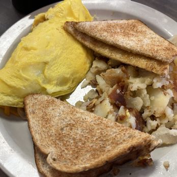 The Crows Nest Diner - Create your own omelette (sausage, mushroom, and cheddar), home fries, and wheat toast - American Near Me - North Canton, Ohio The Crows Nest Diner - Create your own omelette (sausage, mushroom, and cheddar), home fries, and wheat toast - American Near Me - North Canton, Ohio