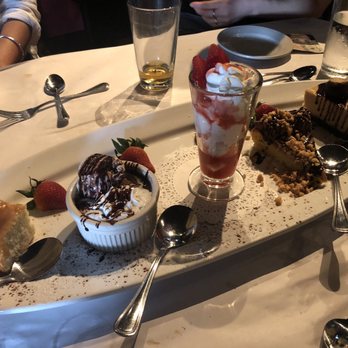Barcelona - Five desserts sampler Flan Tres Leches Pastel De Cchocolate strawberry shortcake almond cake - Spanish Near Me - Columbus, Ohio