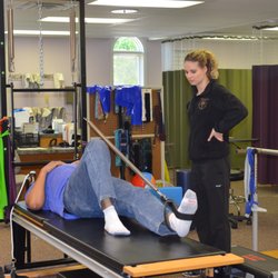 Synergy Health Partners - Physical Therapy - Physical therapy using Pilates and the reformer.