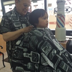 Carmines Barber Shop - The 1st timer :).. I like The way Orlando did to my sons hair.. :) he is so nice..