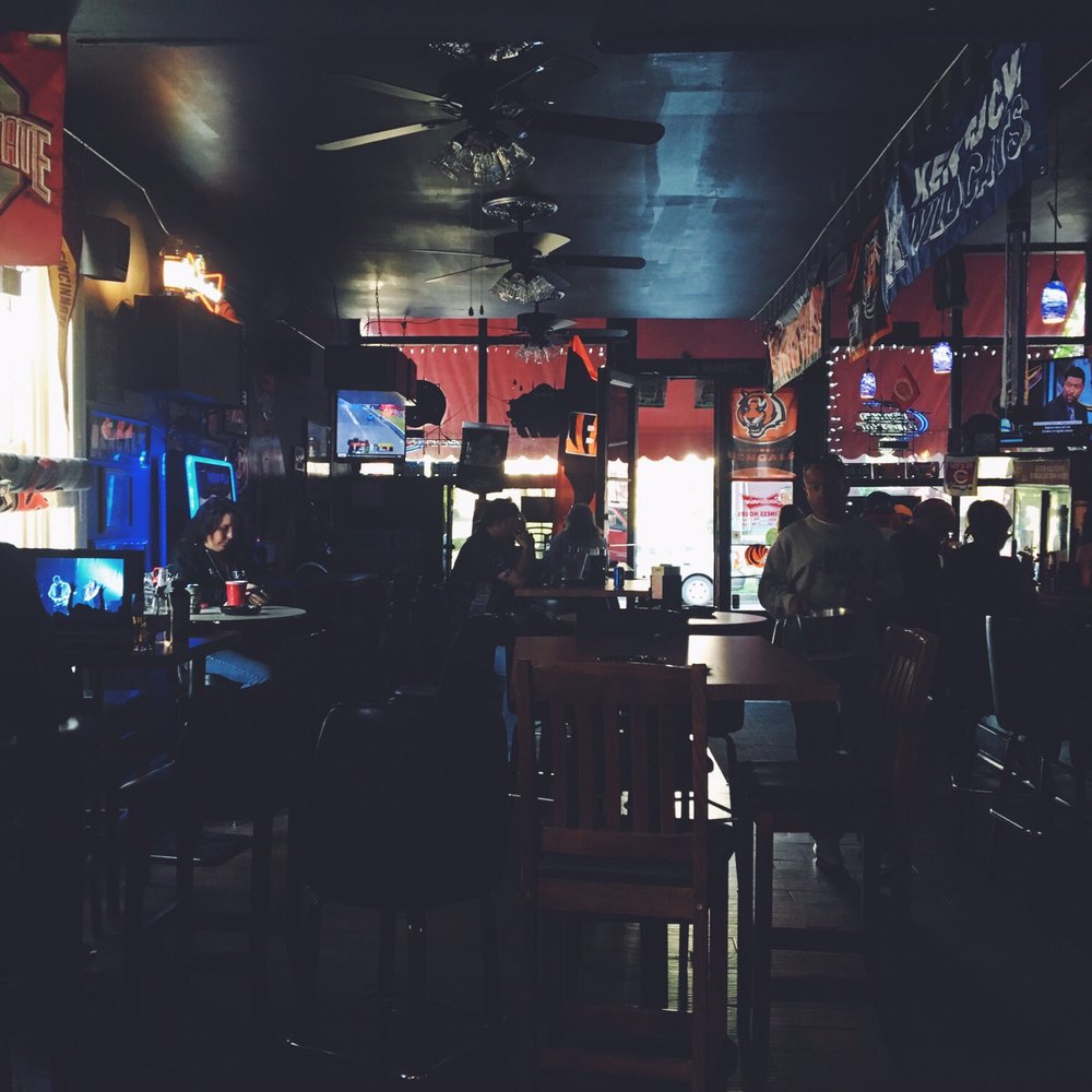 Happy Days Tavern - people sitting at the bar - Sports Bars Near Me - Covington, Kentucky Happy Days Tavern - people sitting at the bar - Sports Bars Near Me - Covington, Kentucky