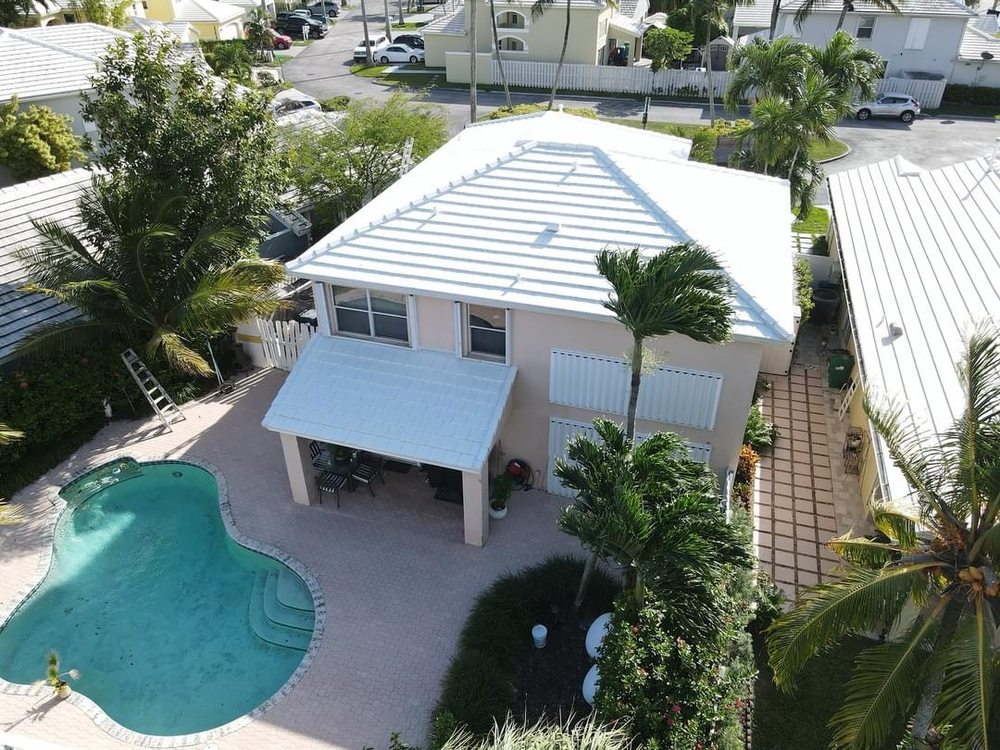 Slide of TJ Platinum Roofing