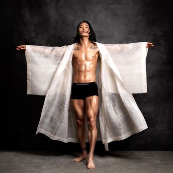 Gugwa - A bold and artistic male portrait featuring a Korean robe and dynamic pose, showcasing elegance and strength in Studio Soo's style. - Session Photography Near Me - Northbrook, Illinois