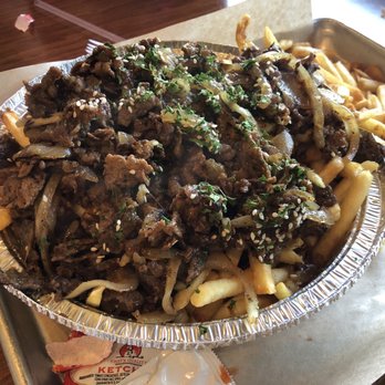 Nguyen's Kitchen - Garlic fries with double bulgogi! - Vietnamese Near Me - Orange, California