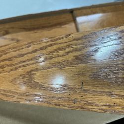 Floor & Decor - Examples of small holes in the wood