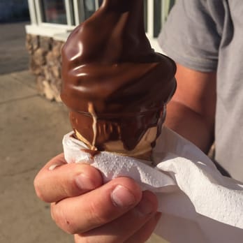 Tom's Straw Hat - Messily dipped chocolate baby cone- all over the place - Ice Cream & Frozen Yogurt Near Me - Twin Lakes, Wisconsin