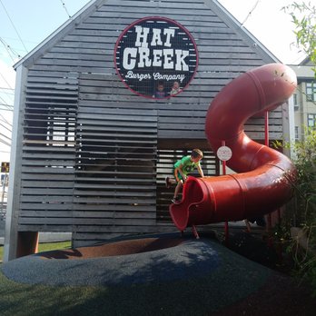 Hat Creek - Outdoor playground (enclosed so the kiddos can't escape) - Burgers Near Me - Austin, Texas Hat Creek - Outdoor playground (enclosed so the kiddos can't escape) - Burgers Near Me - Austin, Texas