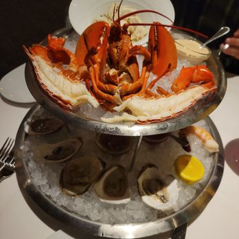 Eddie V's Prime Seafood - Shellfishtower accompanied by great sauces - Seafood Near Me - Plano, Texas Eddie V's Prime Seafood - Shellfishtower accompanied by great sauces - Seafood Near Me - Plano, Texas