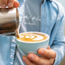Pura Vida Miami - Handcrafted coffee with latte art, served in a warm and welcoming all day café atmosphere.