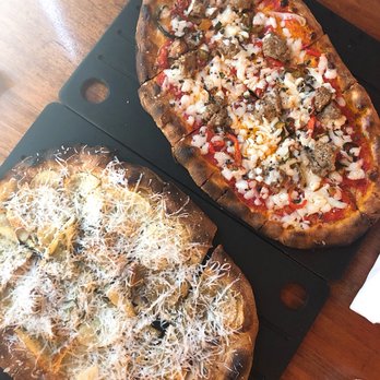 Serious Pie Downtown - Yukon Gold Potato Pizza and Sweet Fennel Sausage Pizza - Pizza Near Me - Seattle, Washington
