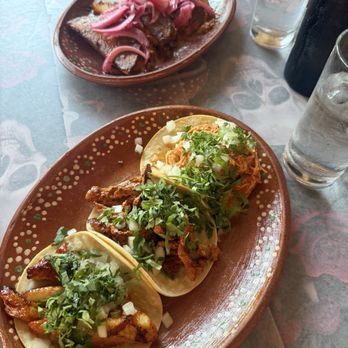 Tacos Vs Burritos - Front from left to right: snapper taco, AL PASTOR TACO, POLLO GUISADO TACO. Back: COCHINITA PIBIL CLASIC - Breakfast & Brunch Near Me - Miami, Florida Tacos Vs Burritos - Front from left to right: snapper taco, AL PASTOR TACO, POLLO GUISADO TACO. Back: COCHINITA PIBIL CLASIC - Breakfast & Brunch Near Me - Miami, Florida