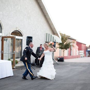 Perry's Catering - Happy Couple dancing by the buffet filled with delicious food that feeds the soul! - Caterers Near Me Perry's Catering - Happy Couple dancing by the buffet filled with delicious food that feeds the soul! - Caterers Near Me