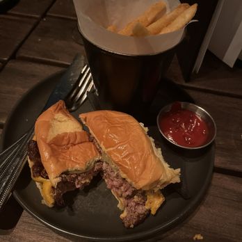 Brass Eye - Burger and fries for about $22 or $23. - Bars Near Me - Columbus, Ohio