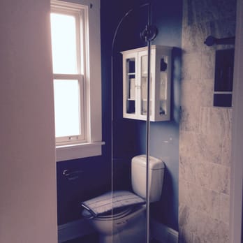 R Wilson Construction - a bathroom with a toilet and shower - General Contractors Near Me - Portland, Oregon R Wilson Construction - a bathroom with a toilet and shower - General Contractors Near Me - Portland, Oregon