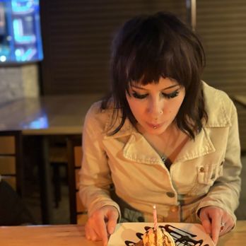 BLK Earth Sea Spirits - Birthday girl blowing out candles! - Seafood Near Me - Huntington Beach, California BLK Earth Sea Spirits - Birthday girl blowing out candles! - Seafood Near Me - Huntington Beach, California