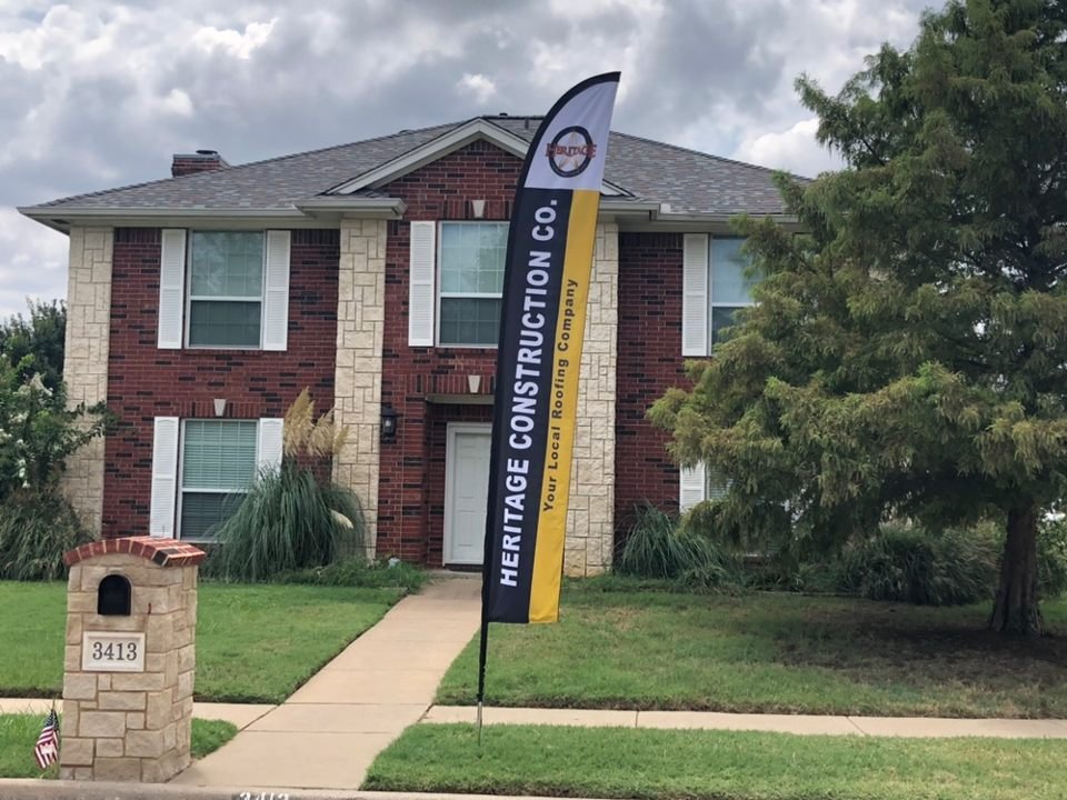 Slide of Heritage Roofing & Construction