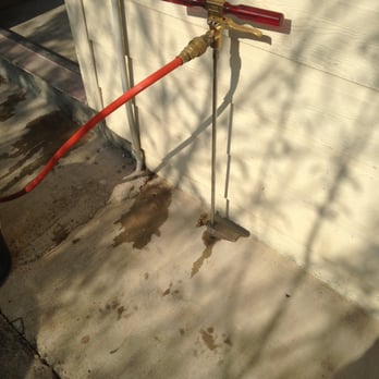 Optimal Safe Pest - after drilling its ready to apply the termiticide to create a barrier under neat the slab and be fully protected for termites - Pest Control Near Me - Wylie, Texas