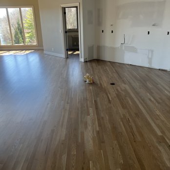 WR Hardwood Floors - a room with a hard wood floor - Flooring Near Me WR Hardwood Floors - a room with a hard wood floor - Flooring Near Me
