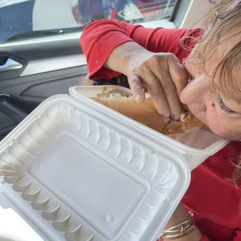 Sabor Venezolano Doral - My sis enjoying the hot dog - Venezuelan Near Me - Doral, Florida Sabor Venezolano Doral - My sis enjoying the hot dog - Venezuelan Near Me - Doral, Florida