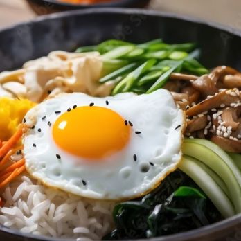 Pine Tree House - "Dolsot Bibimbap (Hot Stone Bowl with Rice, Beef, Egg, Carrots, Zucchini, Mushrooms, Radish & Bean Sprouts - Korean Near Me - Sacramento, California Pine Tree House - "Dolsot Bibimbap (Hot Stone Bowl with Rice, Beef, Egg, Carrots, Zucchini, Mushrooms, Radish & Bean Sprouts - Korean Near Me - Sacramento, California