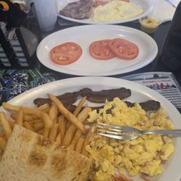 Eggs bacon and fries