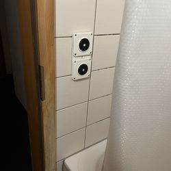 Hotel Alpina - 220 volt switches within shower stalls puts the occupants at risk of serious injury or death