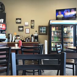 Epic Market & Grill - 6 tables, 2 high tops and 4 chairs