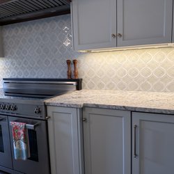 Prestige Marble & Granite - Kitchen done by Prestige, including grate above range.