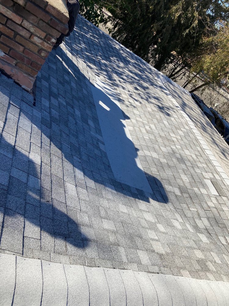 Slide of Al's roofing repairs