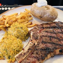 Old Trail Tavern - Bone-in ribeye with crab cakes