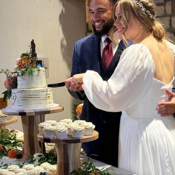 Sift Cakery - The happy couple cutting the cake. - Custom Cakes Near Me - Logan, Ohio