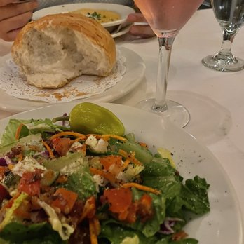 Bob's Steak & Chop House - Chop salad and cosmopolitan  Lobster bisque in the back - Steakhouses Near Me - Grapevine, Texas