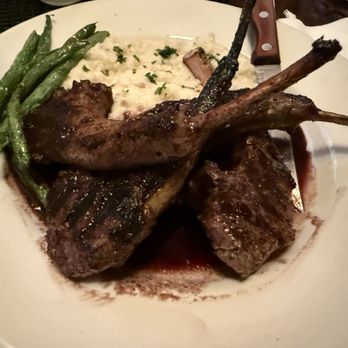 Gypsy Bistro - This was the rack of lamb with a delicious blackberry reduction, served with polenta and seasonal green beans! It was absolutely delish! - American Near Me - Lockeford, California Gypsy Bistro - This was the rack of lamb with a delicious blackberry reduction, served with polenta and seasonal green beans! It was absolutely delish! - American Near Me - Lockeford, California