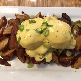 Yolks - $16.95 Poached Bennie with real hollandaise sauce over truffle-lemon potatoes. - Coffee & Tea Near Me - Vancouver, British Columbia Yolks - $16.95 Poached Bennie with real hollandaise sauce over truffle-lemon potatoes. - Coffee & Tea Near Me - Vancouver, British Columbia