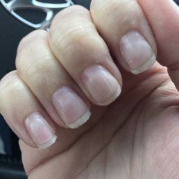 Ragged nail ends, remaining dip powder on the surface and the surface is so rough it catches on everything.
