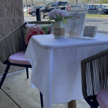 Le Petit Pastry & Tea - a table with a laptop on it - Tea Rooms Near Me - Cape Coral, Florida Le Petit Pastry & Tea - a table with a laptop on it - Tea Rooms Near Me - Cape Coral, Florida