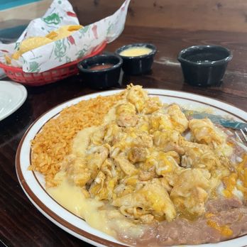 El Cuervero - Chicken Chimichanga with rice and beans plus chips and salsa - Mexican Near Me - Oklahoma City, Oklahoma El Cuervero - Chicken Chimichanga with rice and beans plus chips and salsa - Mexican Near Me - Oklahoma City, Oklahoma