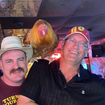 Diggs Restaurant & Club - two men with hats on their heads - Steakhouses Near Me - San Saba, Texas Diggs Restaurant & Club - two men with hats on their heads - Steakhouses Near Me - San Saba, Texas