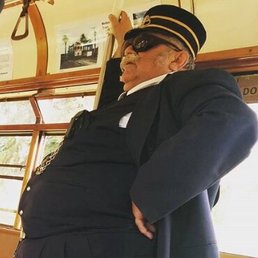 Dapper conductor on the High Level Bridge Streetcar