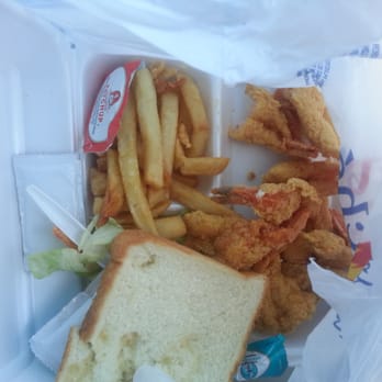 T P Seafood - start eating while driving. shrimp always hot:-) - Seafood Markets Near Me - Houston, Texas