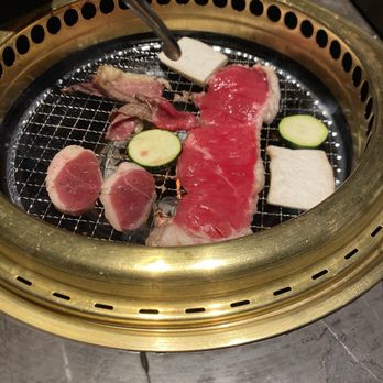 Niku Feast Yakiniku - Cooking meats and some zucchini - Barbeque Near Me - Seattle, Washington Niku Feast Yakiniku - Cooking meats and some zucchini - Barbeque Near Me - Seattle, Washington