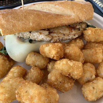 Butter Cafe & Bakery - Chicken artichoke sandwich comes with a side of tots/fries/salad! - Breakfast & Brunch Near Me - Upland, California Butter Cafe & Bakery - Chicken artichoke sandwich comes with a side of tots/fries/salad! - Breakfast & Brunch Near Me - Upland, California