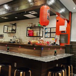 Megumi Japanese Ramen & Sushi Bar - The decor on point. Even the One Piece wall scroll